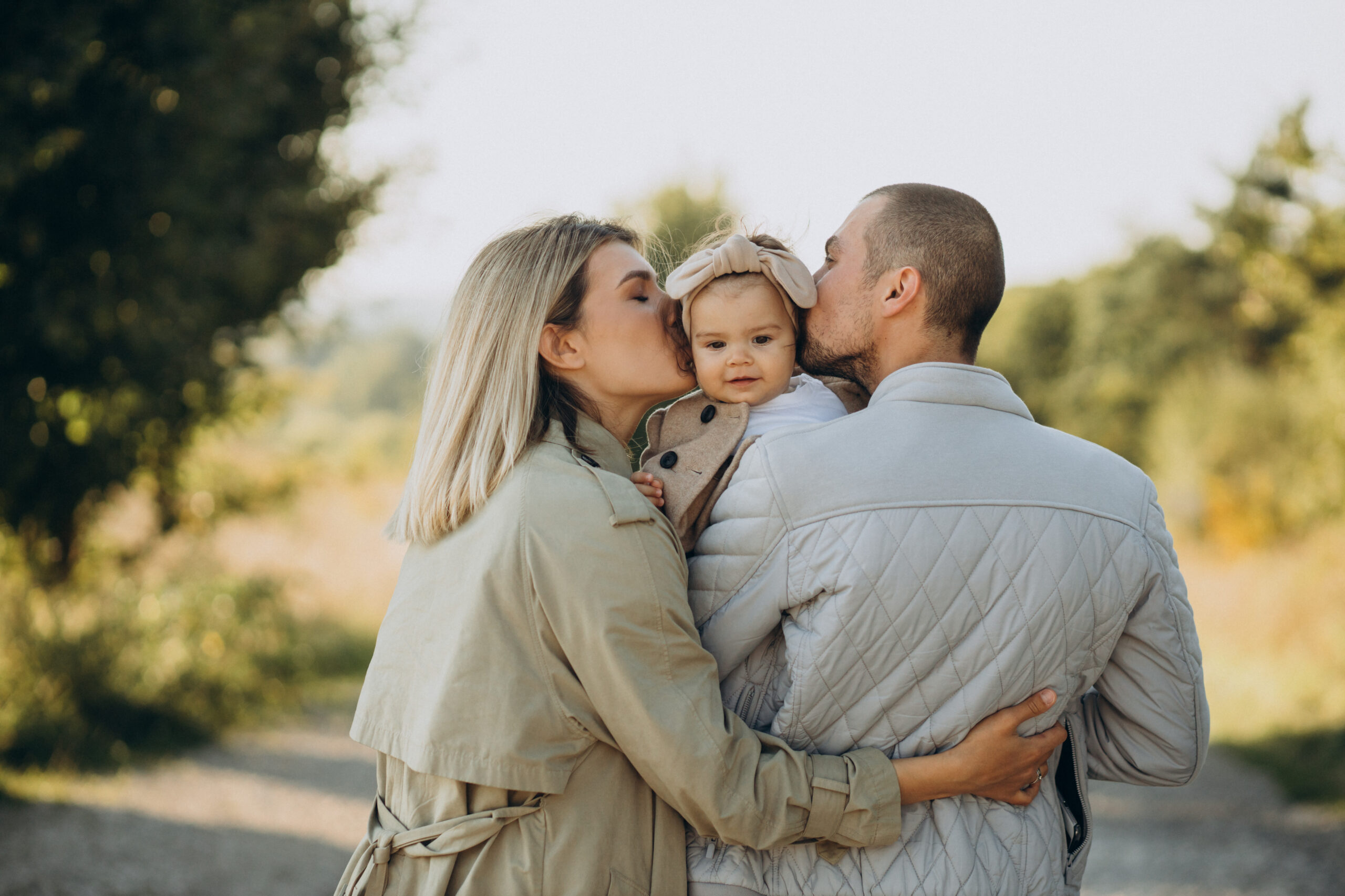 family-with-little-daughter-spending-time-together-sunny-field